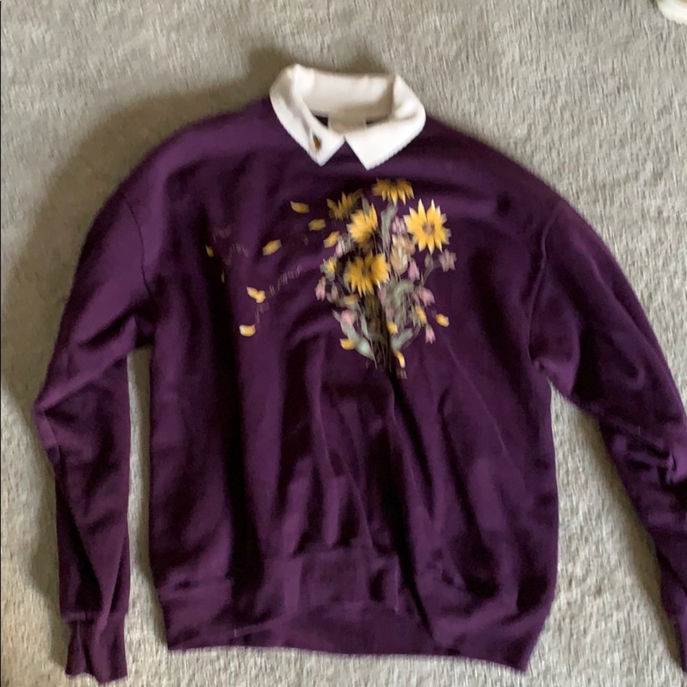 Purple collared sweatshirt with cute designs